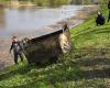 in an underwater cleanup in Jelgava, divers remove a container full of garbage from the river / Article