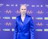 Don attends the turquoise blue carpet of the opening of Eurovision in a dark blue suit